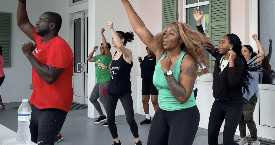 Group of people dancing in a class.